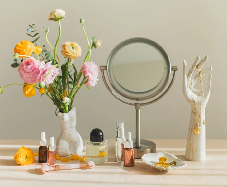 Mirror and cosmetic products on female table at home. cosmetica eco